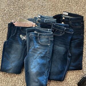 Girls jeans 2 are size 14/16 and 2 are size 14 one is size 16